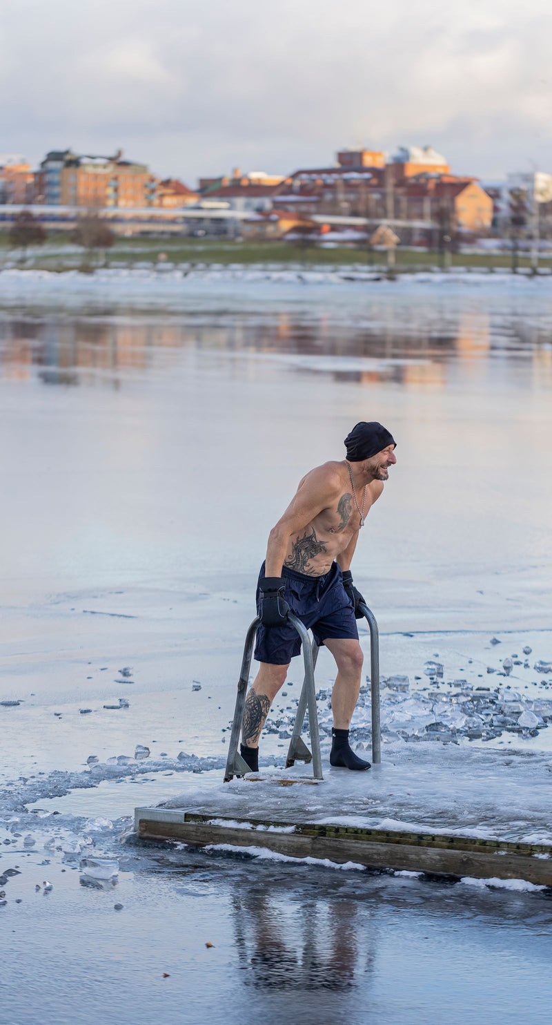Person in cold water immersion, one half of a hot-and-cold contrast routine.