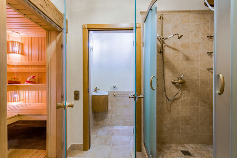 Premium spa-style space with a sauna, representing a luxury home recovery area.