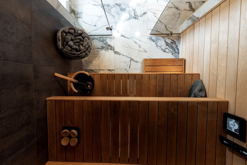 Modern sauna interior, representing the heat side of the hot-versus-cold debate.