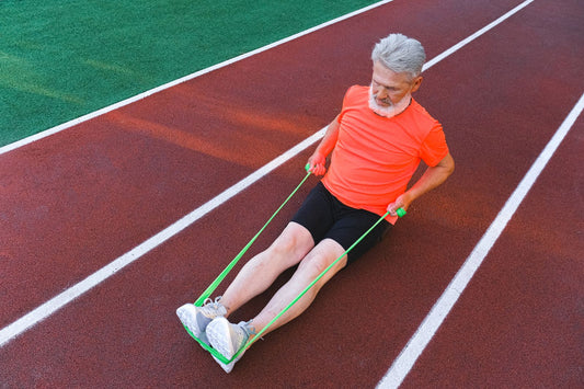 Active older adult stretching, representing healthy ageing and sauna longevity.