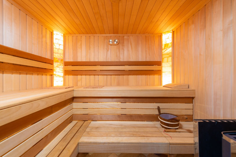 Warm wooden sauna interior, a soothing environment for easing joint stiffness.