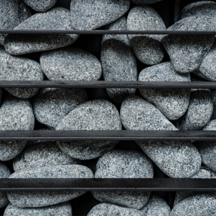 Stack of gray stones with metal shelves