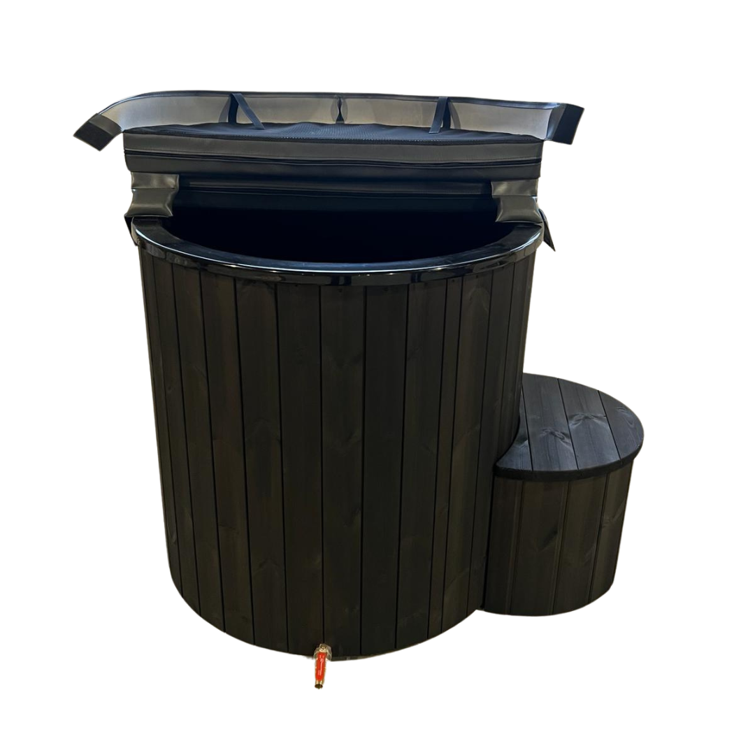 Compact single-person ice bath installation on an outdoor wooden deck, featuring a brown wooden exterior, a white insulated top, and including a black high-performance chiller.