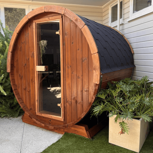 Ergo Barrel Sauna - interior of wooden sauna with stove